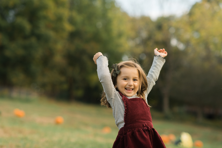 Fall is in full swing here in NJ, my first Fall Family session with Anna and Adam at their Farm House in Hackettstown NJ. Anna and Adam recently purchased their dream farm house on a 4 acres of land. This family of four now has chickens, ducks, birds, cats, a dog, sheep and plans to add many more to the list in the future. I had the honor of visiting Anna and Adam and their two beautiful children at their Farm the other day. I got much need vitamin D walking around the property, enjoying the foliage, running around with their kids and meeting all the farm animals. I sincerely enjoy photographing families now because there are no dull moments with kids, every moment is perfect! Fall family session at Anna and Adam’s Farm at Hackettstown NJ photographed by Karis from HeyKaris.